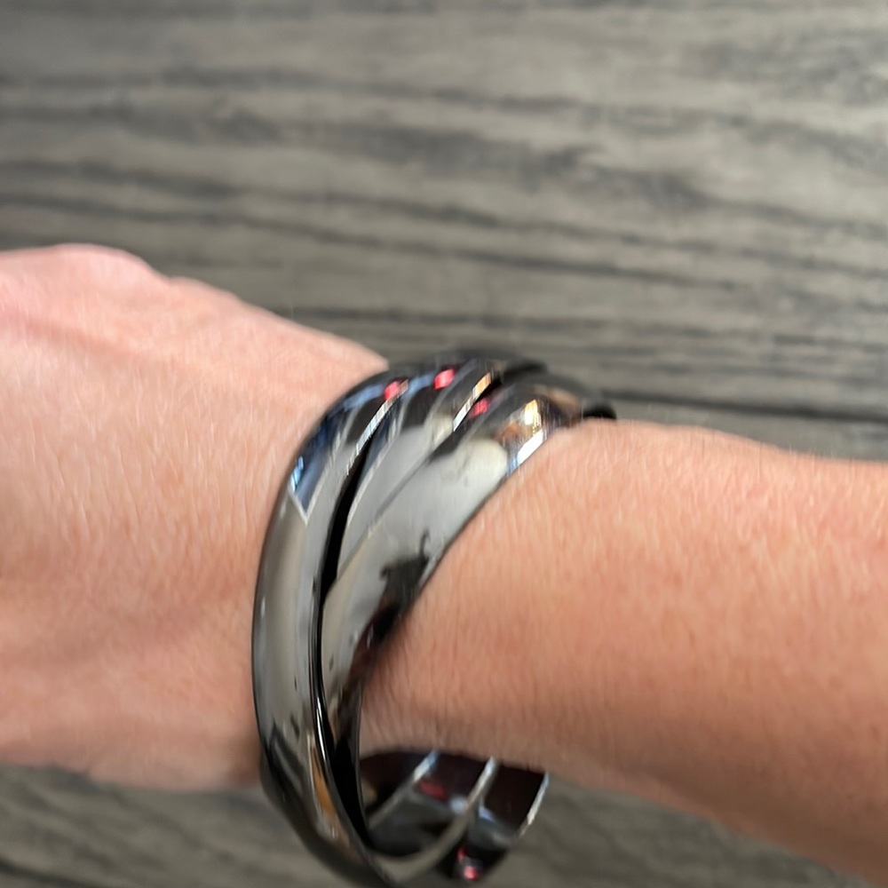 3 entangled black bracelets